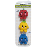 Three colorful fruit-shaped dog toys on a Ruff-Tex packaging with text.