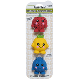 Three colorful fruit-shaped dog toys on a Ruff-Tex packaging with text.