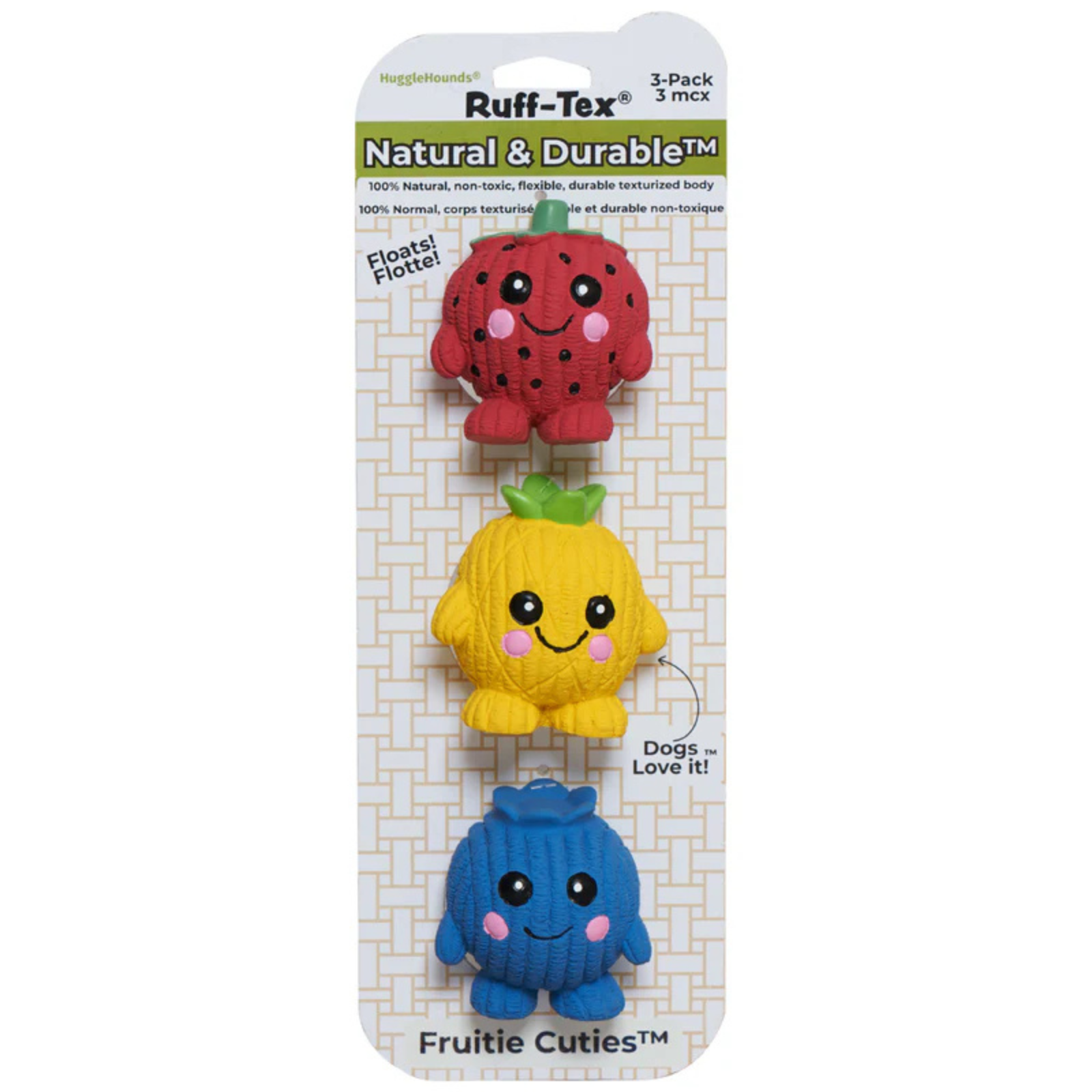 Three colorful fruit-shaped dog toys on a Ruff-Tex packaging with text.