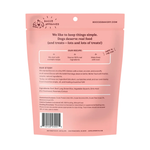 Back view of a pink Bocce Approved dog food pouch on a white background, showing product information, ingredients, and a barcode.