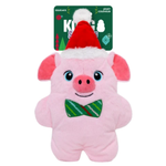 A pink plush pig toy with a red Santa hat and green bow tie, attached to a green Kong brand hangtag, on a plain white background.