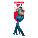 Kong Wubba squeaker toy dog toy in its original retail packaging, featuring a blue plush monkey head with a beige snout and ears, and three long blue fabric tails.