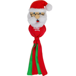 A Kong Wubba dog toy shaped like Santa's head, featuring a red plush Santa hat with a white pom-pom, a white faux-fur beard, a red face area with embroidered eyes and nose, and two long dangling tails in red and green.