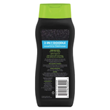 A bottle of 2-in-1 Doodle Shampoo & Conditioner on a plain white background, showing the back of the black bottle with a bright lime green cap and a blue label.