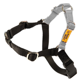 Black and gray dog harness with a visible brand label on a white background