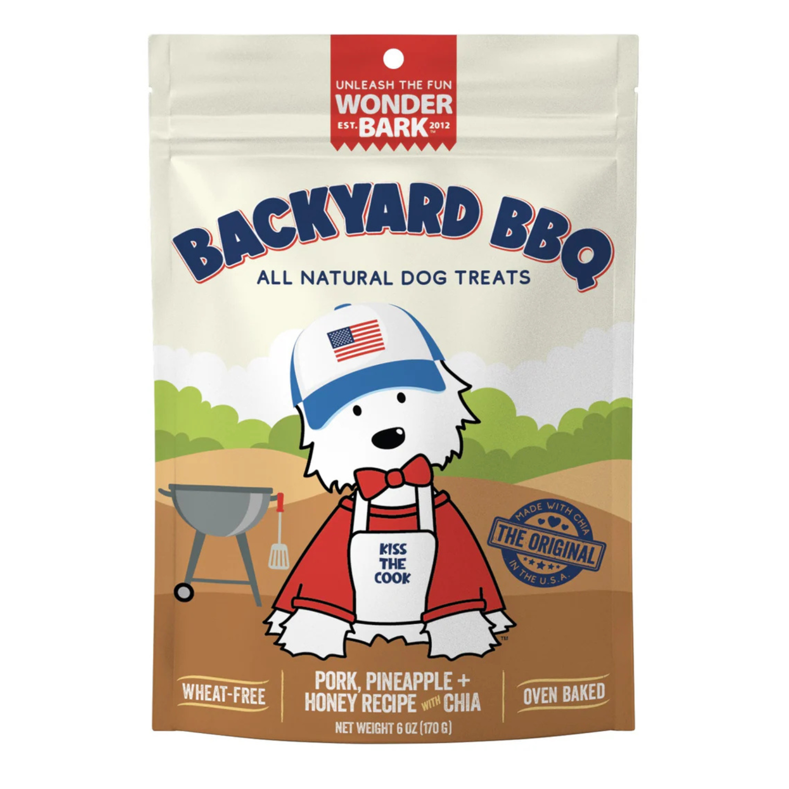 A stand-up pouch of Backyard BBQ All Natural Dog Treats on a plain white background. The package features a cartoon dog wearing a grill hat and apron, with text indicating the flavor is pork, pineapple, honey recipe, and chia.