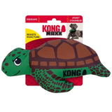 KONG dog toy turtle plush toy in green and brown, shown with its red and white retail packaging card against a white background.
