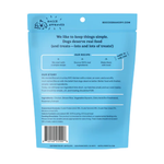 Back view of a light blue Bucci's Bakery dog treat pouch, showing product details, ingredients, and a barcode on a white background.