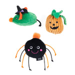 Three Halloween-themed dog toys: a green mouse, orange pumpkin, and black spider on a white background.
