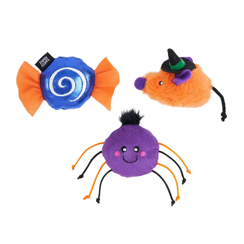 Three Halloween-themed plush toys on a white background