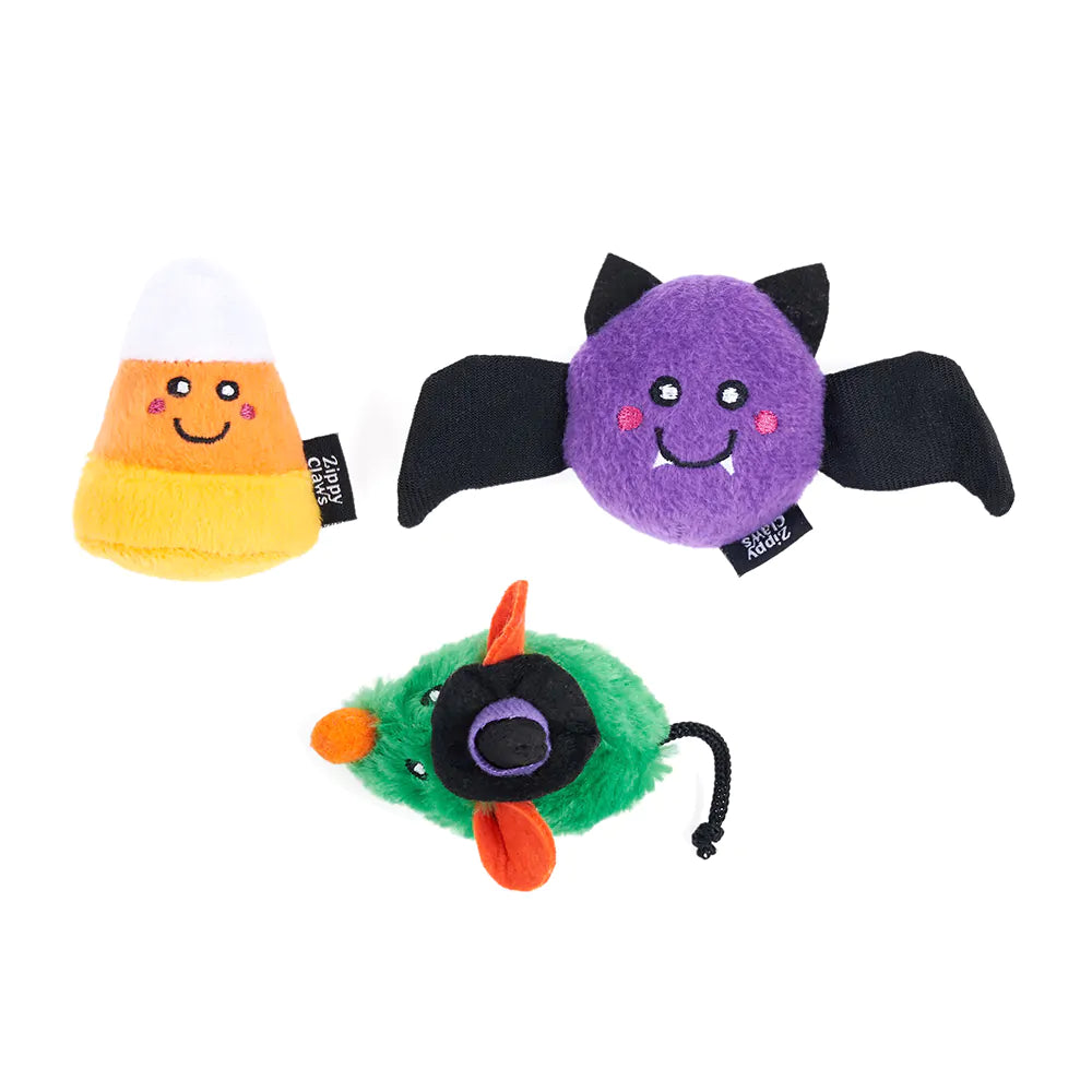 Three Halloween-themed plush toys on a white background