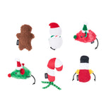 Set of Christmas-themed dog toys on a white background