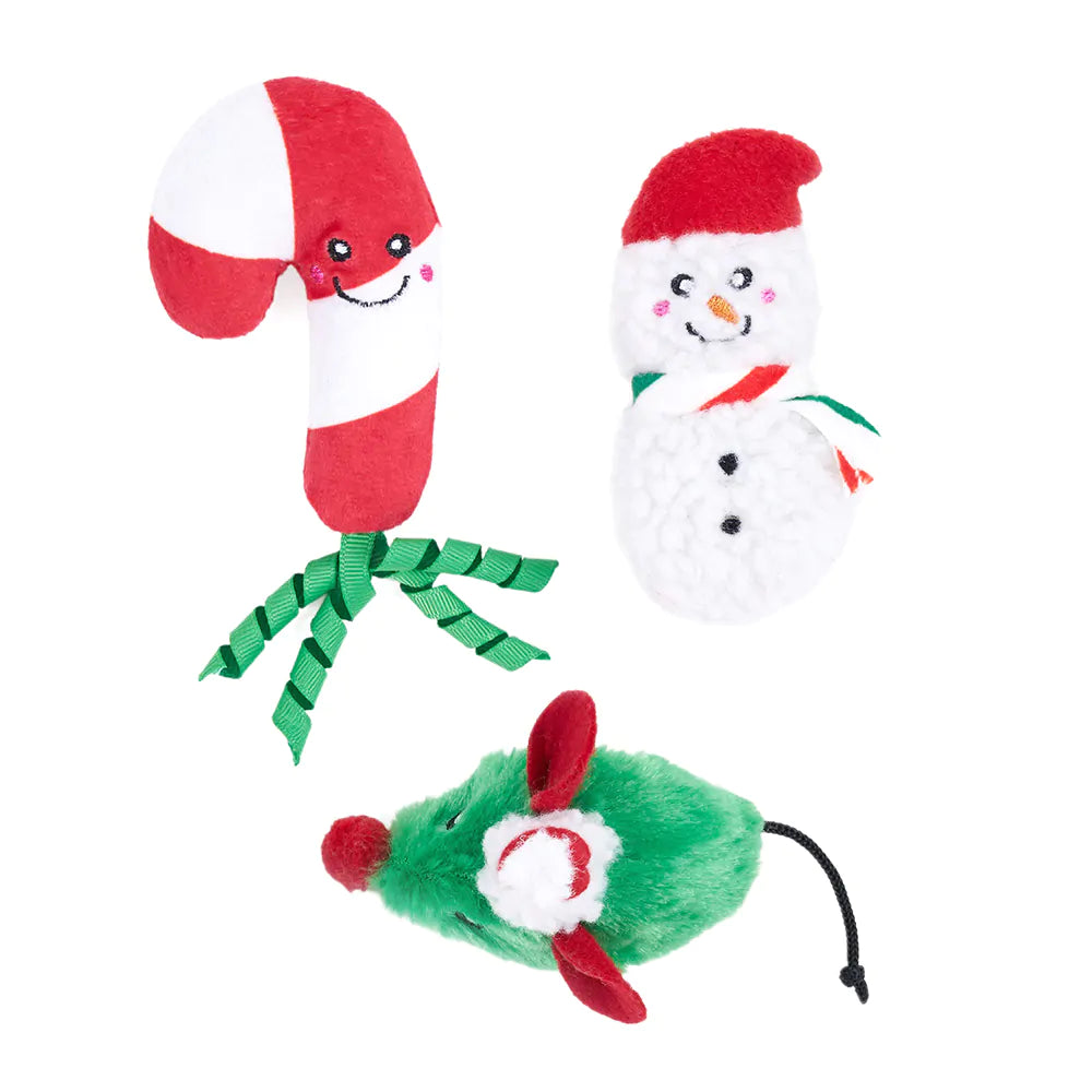Three Christmas-themed toys: a candy cane, a snowman, and a mouse, on a white background.