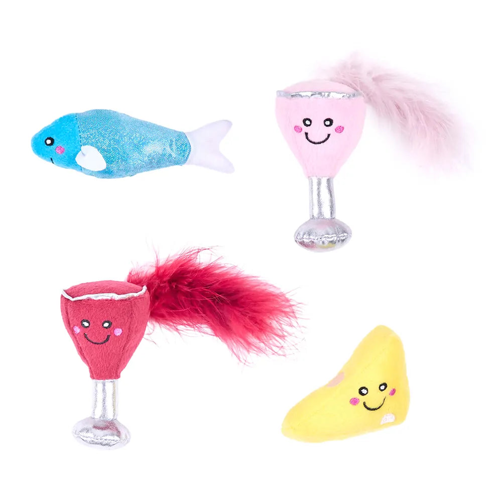Four colorful cat toys shaped like a fish, wine glass, and two different shapes on a white background.