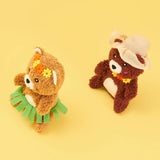 Two plush toys resembling bears on a yellow background