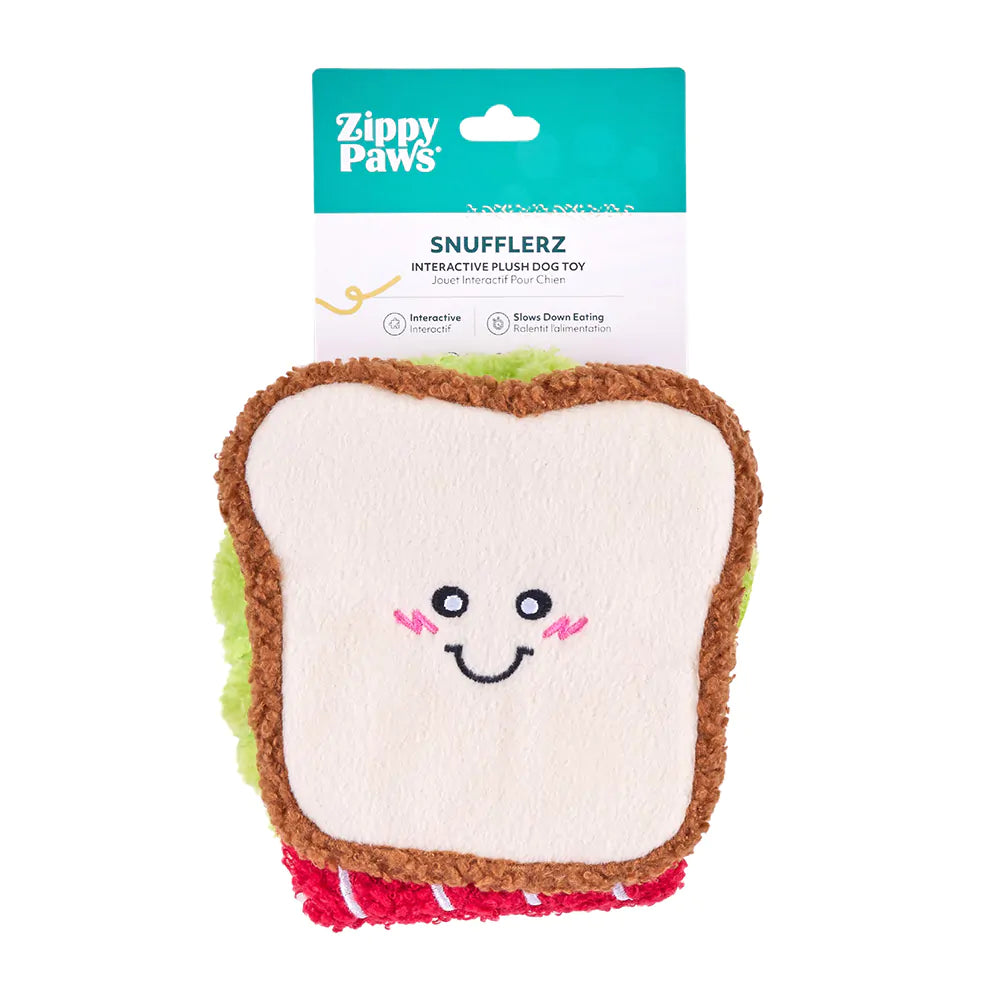 Sandwich-shaped dog toy with a smiling face on a white background, featuring the brand 'Zippy Paws'.