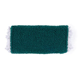 Green scrubber with white trim on a white background