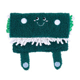 Green plush toy with a smiling face on a white background