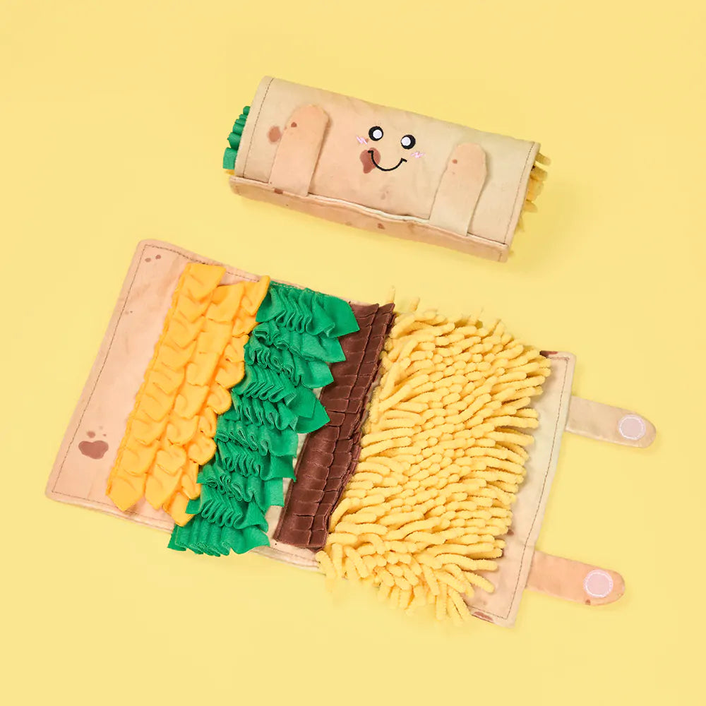 Toy with textured panels and a smiling face on a yellow background