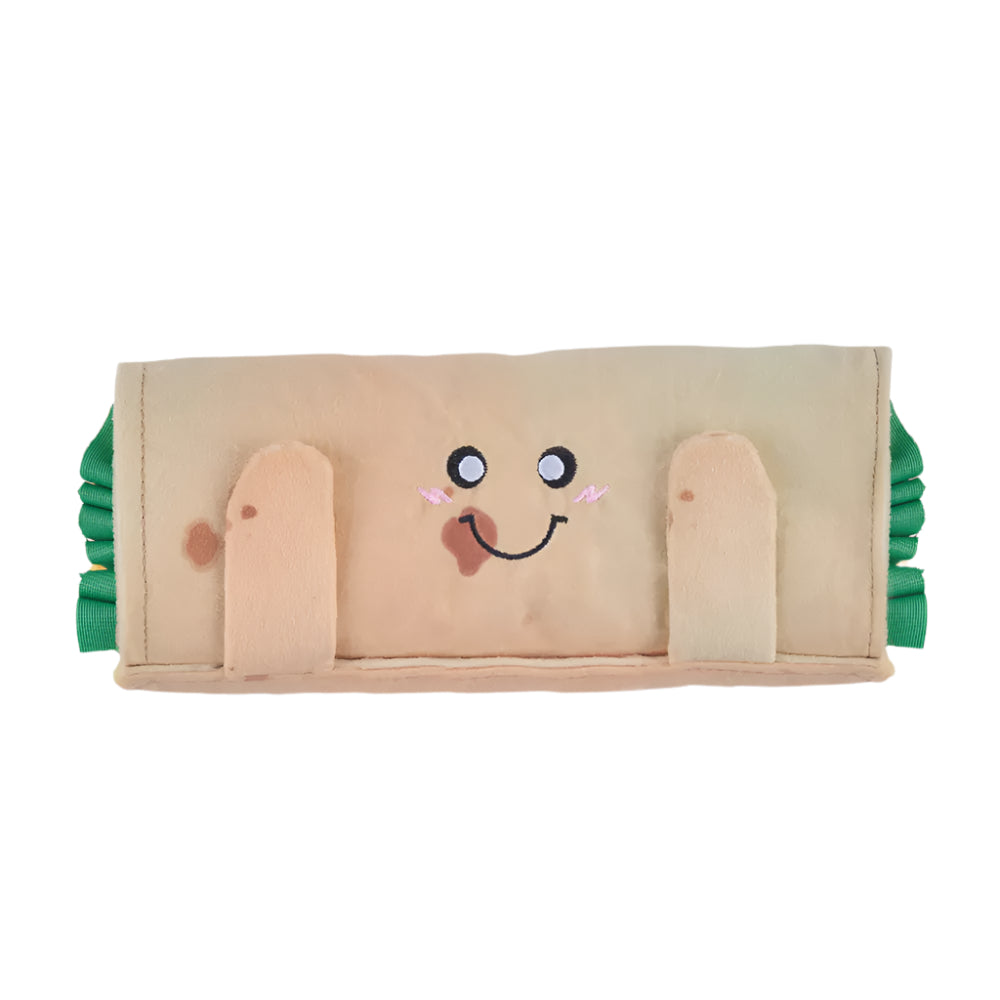 Toy with a face design on a beige background