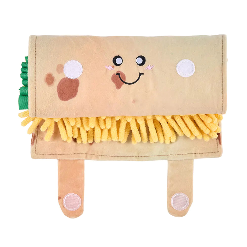 Plush toy resembling a sandwich with a smiling face on a white background