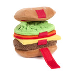 Plush toy shaped like a hamburger on a white background