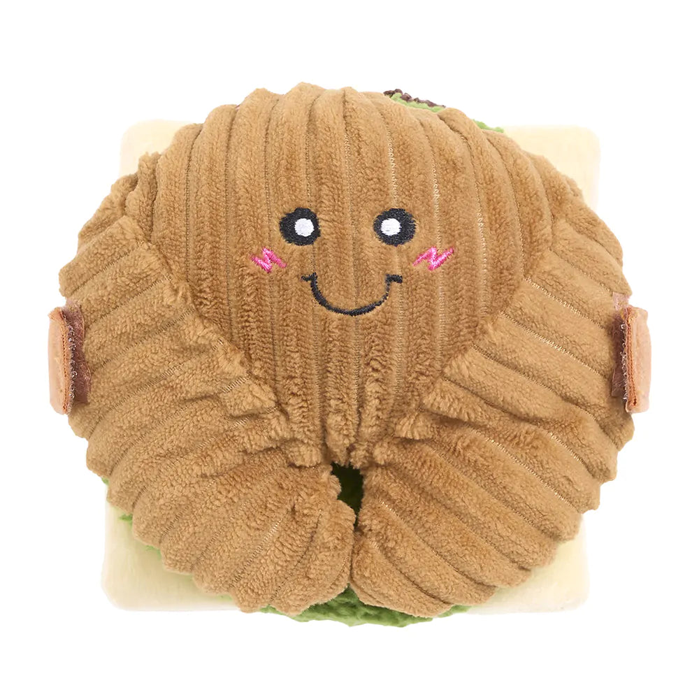 Brown plush toy with a smiling face on a white background