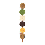 Colorful wooden toy with round, stacked pieces on a white background