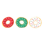 Three colorful donut-shaped cookies with sprinkles on a white background