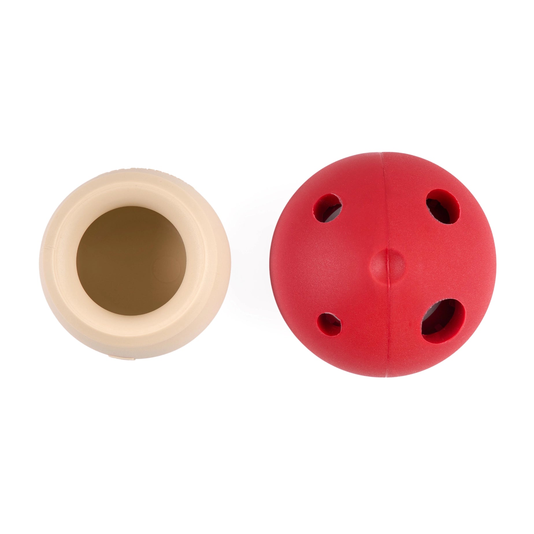 Beige and red ball toys on a white background