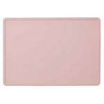 Rectangular pink mat on a light gray background