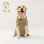 Dog wearing a beige sweater with 'Pets Tale' logo on a white background