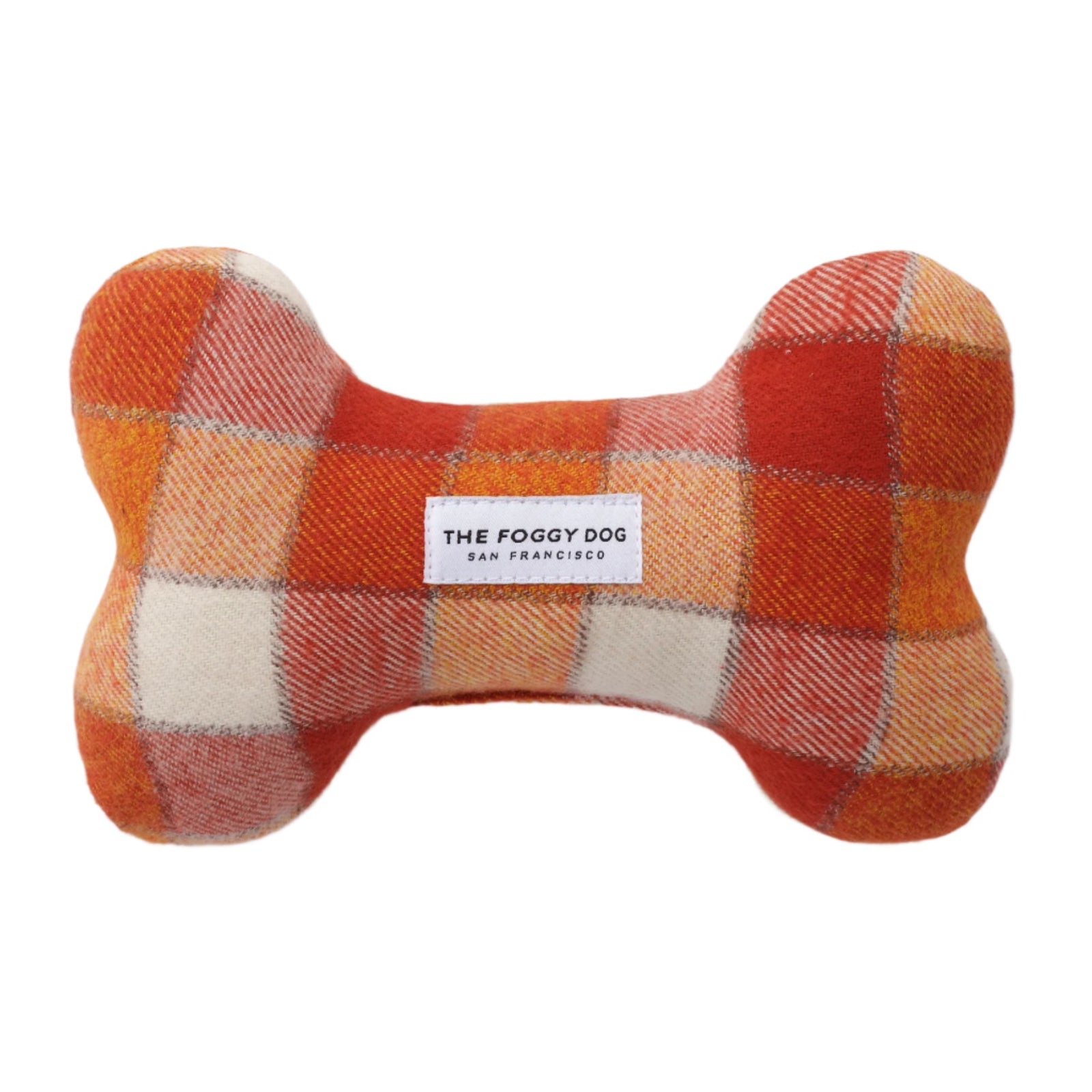Plaid bone-shaped dog toy with 'The Foggy Dog' label on a white background