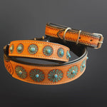 A coiled orange-brown leather belt with turquoise and silver floral conchos, shown on a dark gray gradient background.
