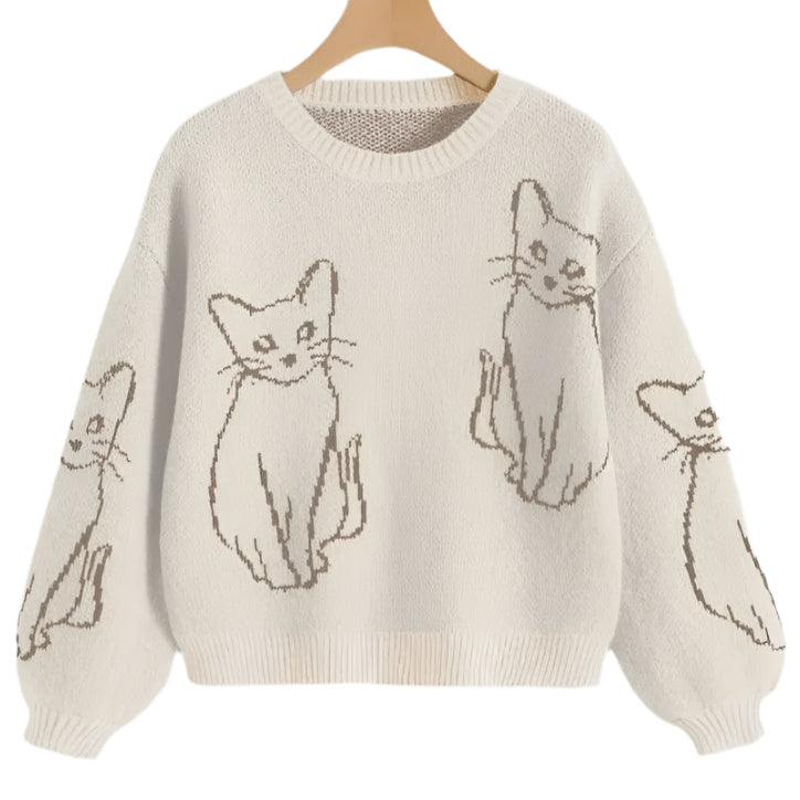 Beige sweater with cat illustrations on a white background