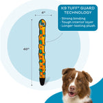 Dog toy with K9 TUFF GUARD TECHNOLOGY label and a dog's face on a blue background