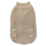 Beige knitted dog sweater with lace-up front on a white background
