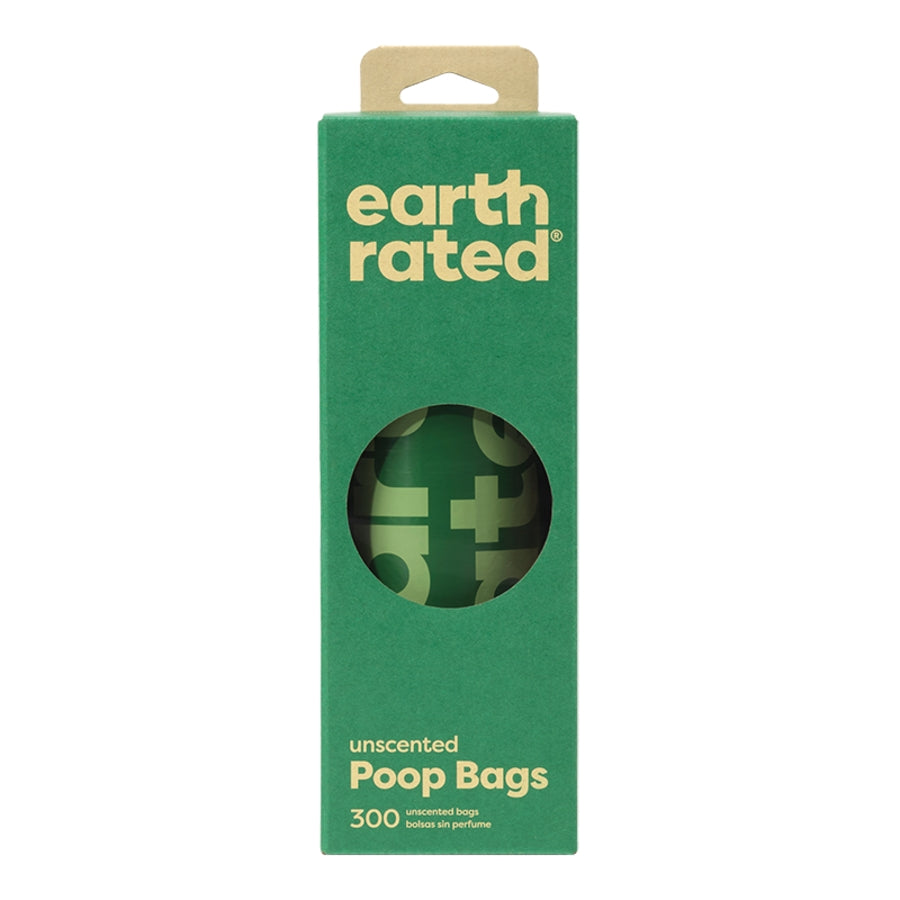 Green package of earth rated poop bags with a clear window showing the product inside.