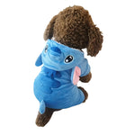 Dog wearing a blue shark costume on a white background
