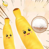 Plush banana toy with a happy face on a beige background