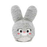 Gray plush toy with a cute face on a white background