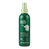 Green bottle of Earth Rated refreshing dog mist on a white background