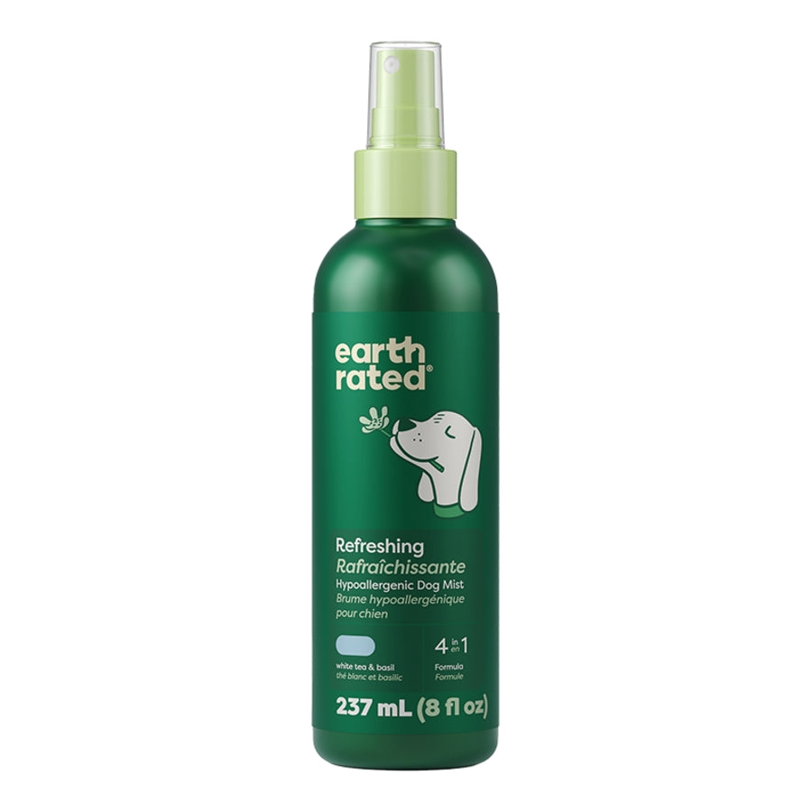 Green bottle of Earth Rated refreshing dog mist on a white background