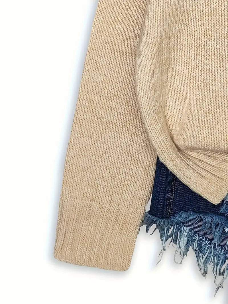 Beige sweater with denim fringe on a white background