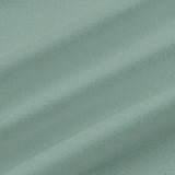 Close-up of teal fabric with visible texture