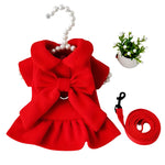 Red pet dress with a bow and matching leash on a white background