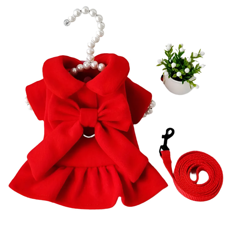 Red pet dress with a bow and matching leash on a white background