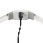 White headband with a black cord on a white background