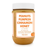 Jar of 'Peanuts Pumpkin Cinnamon Honey' for dogs with a white label on a white background