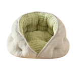 A plush pet bed with a soft, cloud-like shape, featuring a light grey fuzzy exterior and a textured light green ribbed interior, shown against a plain white background.